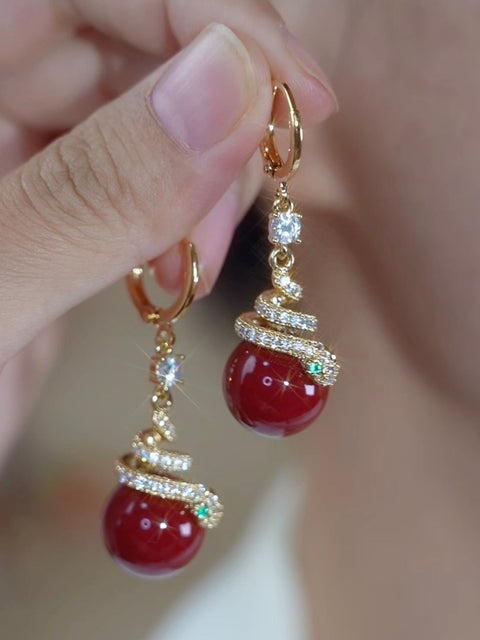 Boucles d'oreilles serpent  en perles rouges