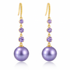 Boucles d'oreilles longues en perles violettes